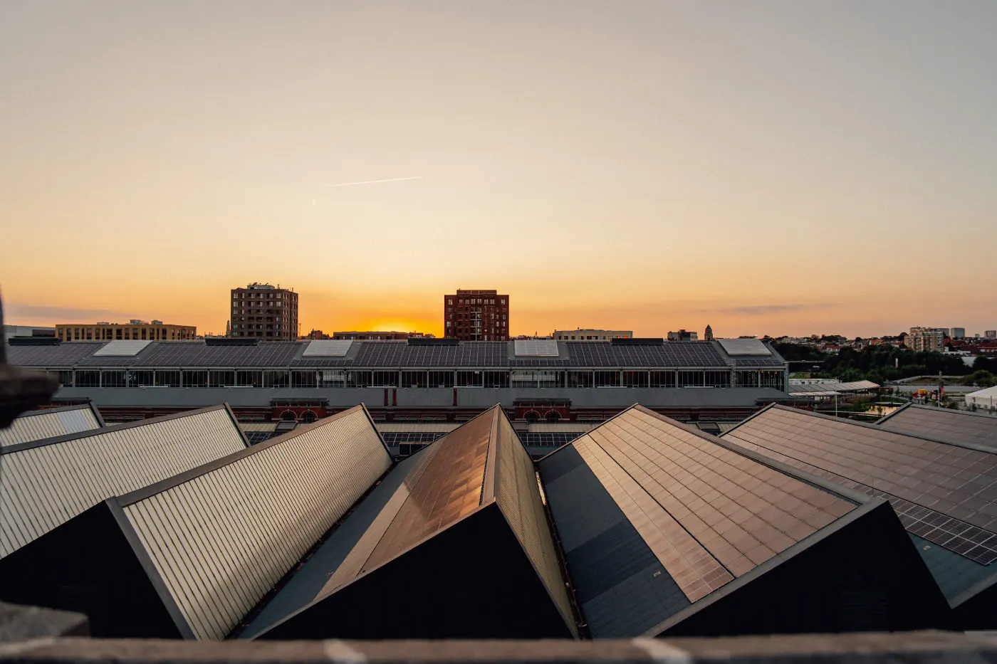 Sunset over the Tour & Taxis rooftops